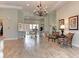 Inviting common area with seating, a decorative chandelier, and community bulletin board at 628 Estuary Dr, Bradenton, FL 34209