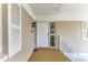 Inviting condo entrance with a bright door, exterior lighting, and a stairway at 628 Estuary Dr, Bradenton, FL 34209