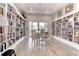 Community library filled with books, a table with chairs, and ample lighting at 628 Estuary Dr, Bradenton, FL 34209