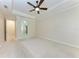 A large main bedroom features a tray ceiling and ensuite access at 6324 41St E Ct, Sarasota, FL 34243