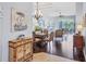 Formal dining area with hardwood floors and elegant chandelier at 7710 Seven Oaks Dr, Bradenton, FL 34201