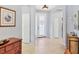 Welcoming foyer with tiled floor and decorative furnishings at 7710 Seven Oaks Dr, Bradenton, FL 34201