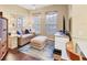 Cozy living room features a plush sofa, ottoman, and stylish decor with great natural lighting at 7710 Seven Oaks Dr, Bradenton, FL 34201