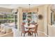 Breakfast nook looking out to screened patio and outdoor area at 7816 Ashley Cir, University Park, FL 34201