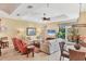 Spacious open concept living area with views to lanai and pool, perfect for relaxation and entertainment at 7816 Ashley Cir, University Park, FL 34201