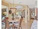 Open concept dining area, showcasing seamless flow and abundant natural light at 7816 Ashley Cir, University Park, FL 34201