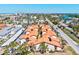 Aerial view of condos near white sandy beaches and turquoise waters, near the city at 800 S Blvd Of The Presidents # 3, Sarasota, FL 34236