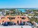 Aerial view of condos near the bay with stunning views of the city skyline at 800 S Blvd Of The Presidents # 3, Sarasota, FL 34236