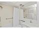 Cozy bathroom with shower-tub combination, grab bars, and ample lighting at 800 S Blvd Of The Presidents # 3, Sarasota, FL 34236