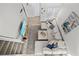 Bright living room featuring plush seating, stylish decor, a modern TV, and plenty of natural light at 800 S Blvd Of The Presidents # 3, Sarasota, FL 34236