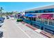 Charming shopping center with colorful storefronts, street parking, and inviting benches for visitors at 800 S Blvd Of The Presidents # 3, Sarasota, FL 34236