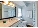 Bathroom featuring modern single sink, vanity, and shower/tub combination at 805 N Bay Blvd, Anna Maria, FL 34216