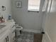 Bathroom featuring modern fixtures, patterned tile flooring, and a clean, updated design at 1002 E Ida St, Tampa, FL 33603