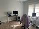 Bedroom with light wood flooring and walls at 1002 E Ida St, Tampa, FL 33603