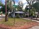Charming single-story home with a cozy front porch and mature trees. Located at the corner of E Ida Street at 1002 E Ida St, Tampa, FL 33603
