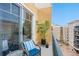 Serene balcony space with a view of the community and courtyard at 1064 N Tamiami Trl # 1604, Sarasota, FL 34236