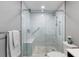 Contemporary bathroom with sleek glass shower, built in bench and modern fixtures at 1064 N Tamiami Trl # 1604, Sarasota, FL 34236