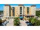 Stunning condo exterior with a grand entrance and ample parking at 1064 N Tamiami Trl # 1604, Sarasota, FL 34236