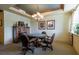 Charming game room with a round game table, comfortable chairs, and decorative lighting for leisure at 1064 N Tamiami Trl # 1604, Sarasota, FL 34236