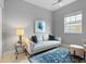 This living room is cozy and inviting with a sofa, rug, and lamp at 1064 N Tamiami Trl # 1604, Sarasota, FL 34236