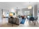 Inviting living room with stylish furnishings and plenty of natural light at 1064 N Tamiami Trl # 1604, Sarasota, FL 34236