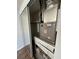 Janitrol HVAC system with mirrored closet doors in view at 107 Grove Rd, Venice, FL 34293