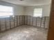 Bedroom undergoing renovation, with exposed wall studs and unfinished floors at 109 Colonia W Ln, Nokomis, FL 34275