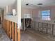Unfinished kitchen with exposed wall studs and plumbing, offering a renovation opportunity at 109 Colonia W Ln, Nokomis, FL 34275