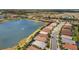 Aerial view of the community showcasing beautiful lakes and lush landscaping for a serene neighborhood setting at 11499 Renaissance Blvd, Venice, FL 34293