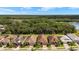 Charming single-story homes showcasing well-maintained landscaping and beautiful tile roofs at 11499 Renaissance Blvd, Venice, FL 34293