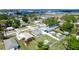 Aerial view of the property with a fenced yard, shed and pool at 1204 25Th W Ave, Palmetto, FL 34221