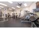 Well-equipped community gym with modern Precor weight machines and ceiling fans at 12810 Kite Dr, Bradenton, FL 34212