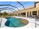 Gorgeous screened pool with a spa and comfortable seating, perfect for outdoor relaxation at 12810 Kite Dr, Bradenton, FL 34212