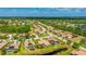 Neighborhood view showing real estate with mature trees and waterway at 12822 Kite Dr, Bradenton, FL 34212