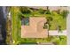 Bird's eye view of home with pool, complemented by lush landscaping and a well-maintained lawn at 12822 Kite Dr, Bradenton, FL 34212