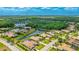 Beautiful aerial view showcasing the real estate and the extensive lakes and natural spaces of the community at 12822 Kite Dr, Bradenton, FL 34212