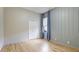 Bright bedroom showcasing hardwood floors, double-door closet, and a serene atmosphere with natural light at 12822 Kite Dr, Bradenton, FL 34212