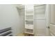 Walk-in closet with built-in shelving at 12822 Kite Dr, Bradenton, FL 34212