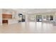Spacious clubhouse interior with tile floor, and ample seating for gatherings and events at 12822 Kite Dr, Bradenton, FL 34212