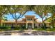 Inviting community clubhouse with manicured landscaping, offering a welcoming gathering place at 12822 Kite Dr, Bradenton, FL 34212