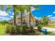 Charming home featuring a hammock and lush landscaping offering a relaxing outdoor space at 12822 Kite Dr, Bradenton, FL 34212