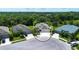 Picture of a neighborhood street with well-maintained homes, lush landscaping and mature trees at 12841 Balsam Ter, Bradenton, FL 34212
