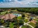 Community featuring a pool, playground, tennis courts, and beautiful landscaping, offering a vibrant lifestyle at 12841 Balsam Ter, Bradenton, FL 34212