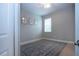 Neutral room featuring tile floors, ample natural light, and framed wall art at 12841 Balsam Ter, Bradenton, FL 34212