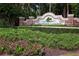 Greyhawk Landing community sign amid lush landscaping, creating an inviting and established neighborhood feel at 12841 Balsam Ter, Bradenton, FL 34212