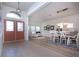 Inviting foyer with double doors leading to open-concept living and dining areas with plenty of natural light at 12841 Balsam Ter, Bradenton, FL 34212