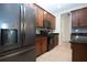 Kitchen with stainless steel appliances, granite countertops, and tile backsplash at 12841 Balsam Ter, Bradenton, FL 34212