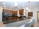 Spacious kitchen with granite countertops, kitchen island, and stainless steel appliances at 12841 Balsam Ter, Bradenton, FL 34212