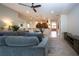 Bright and spacious living room connected to dining area and kitchen for easy living at 12841 Balsam Ter, Bradenton, FL 34212