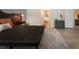 Bedroom features modern furniture, an ensuite bathroom, and a walk in closet at 12841 Balsam Ter, Bradenton, FL 34212